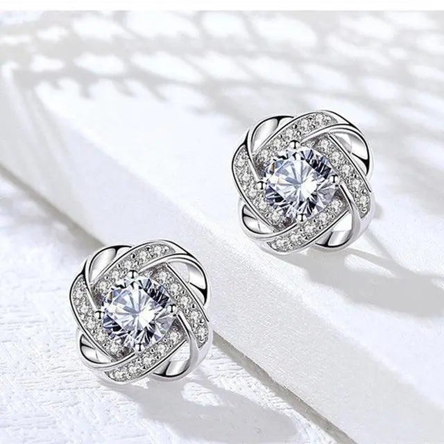 Pendientes Dorados Espiral Floral con Cristales