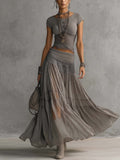 Conjunto Top Transparente de Encaje Gris con Panel y Falda Maxi Plisada
