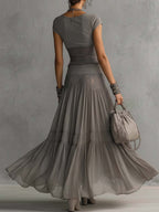 Conjunto Top Transparente de Encaje Gris con Panel y Falda Maxi Plisada