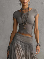 Conjunto Top Transparente de Encaje Gris con Panel y Falda Maxi Plisada