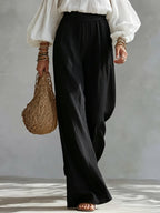 Conjunto Top Blanco Off-the-Shoulder y Pantalón Ancho Negro