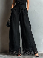 Conjunto Top Halter Negro Símil Algodón-Lino con Lazo y Pantalón Ancho Rematado en Encaje